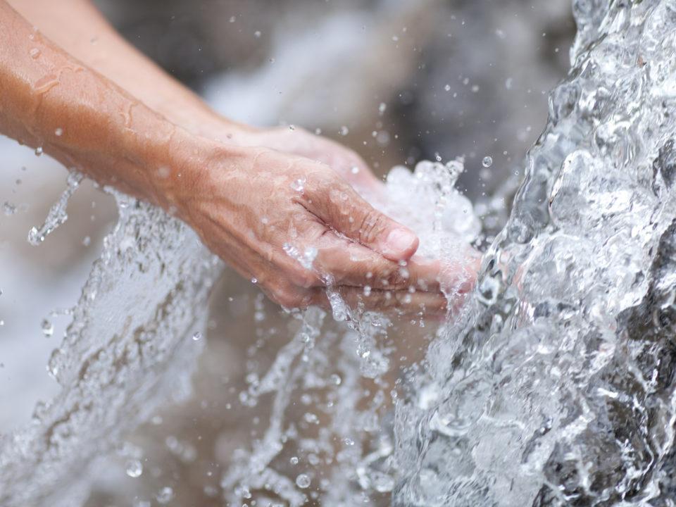 hands fresh drinking water